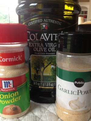 Spread olive oil on the tortilla.