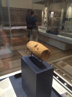 This is the Cyrus Cylinder, which discusses the victory of Cyrus the Great over the king of Babylon. It also refers to the repatriation of captives that were taken from their homeland. 